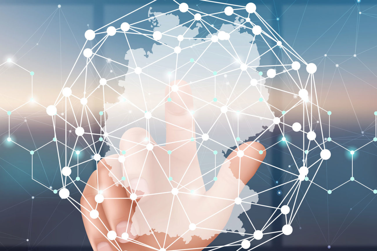 Deutschland mit einer Hand im Hintergrund